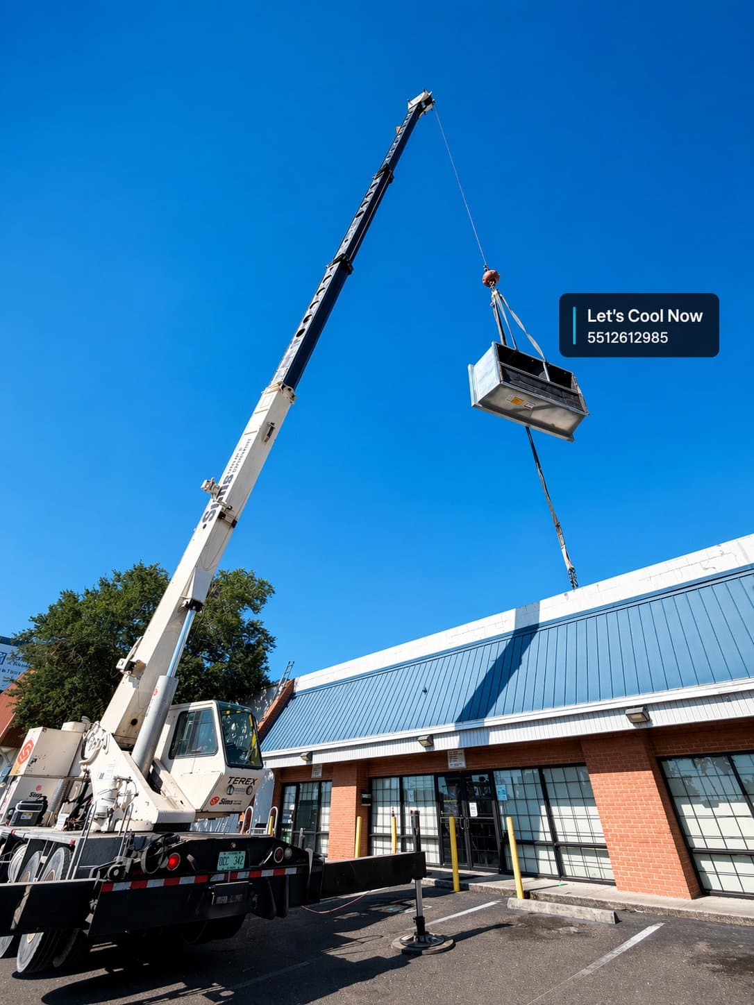 Brandon · rooftop crane lift