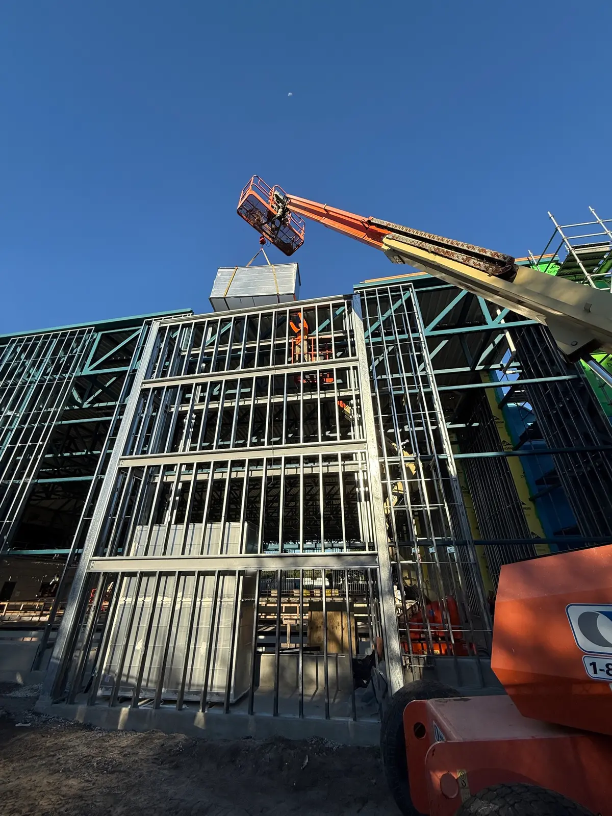 Rooftop equipment set by boom lift at the Long Center