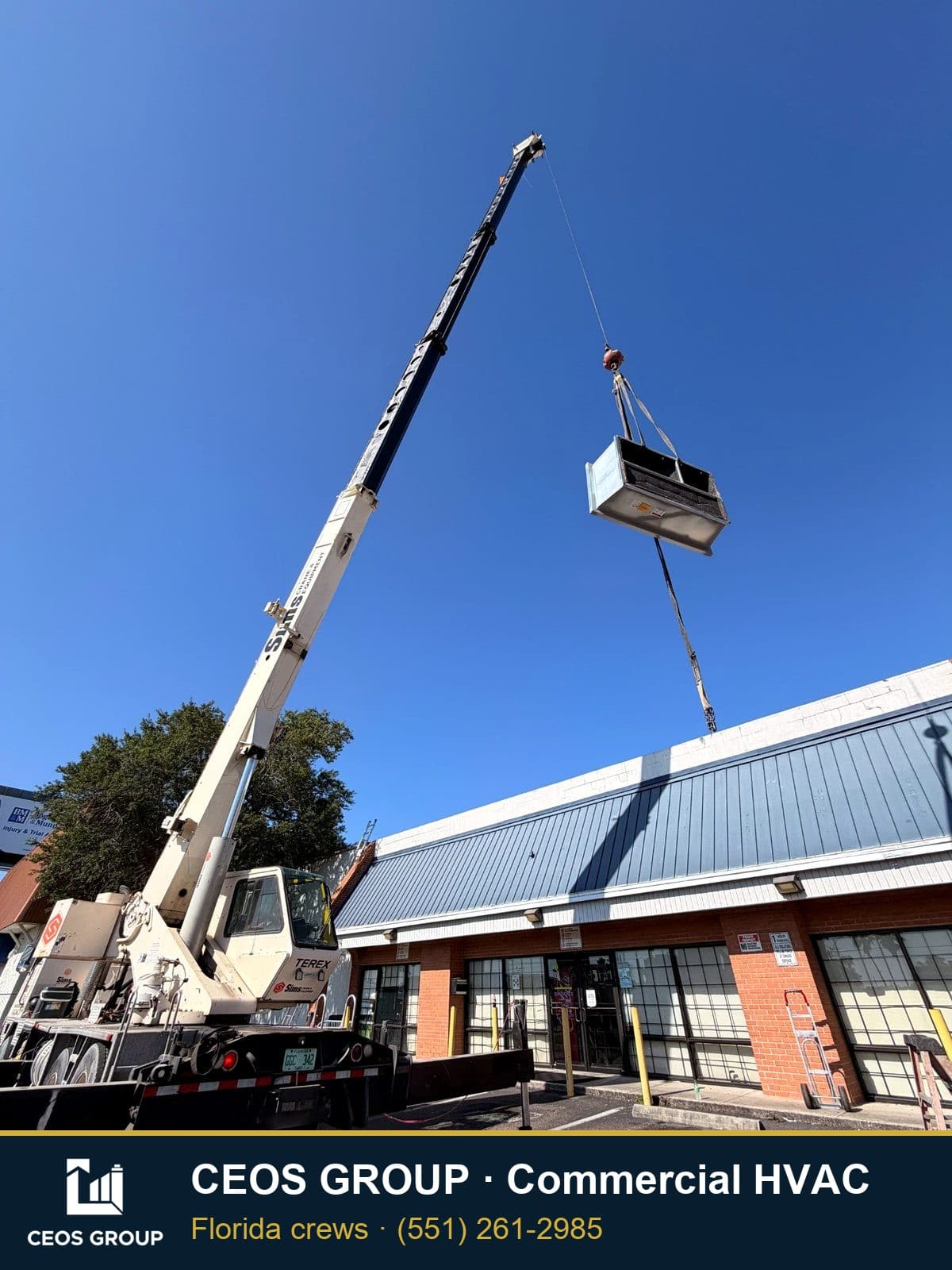 Rooftop unit set by crane